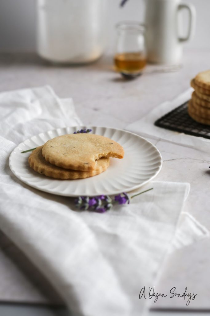 Lavender honey shortbread cookies on a plate - A Dozen Sundays