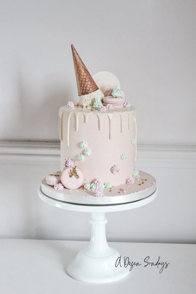 Pink Cake with White Chocolate Ganache Drip by A Dozen Sundays