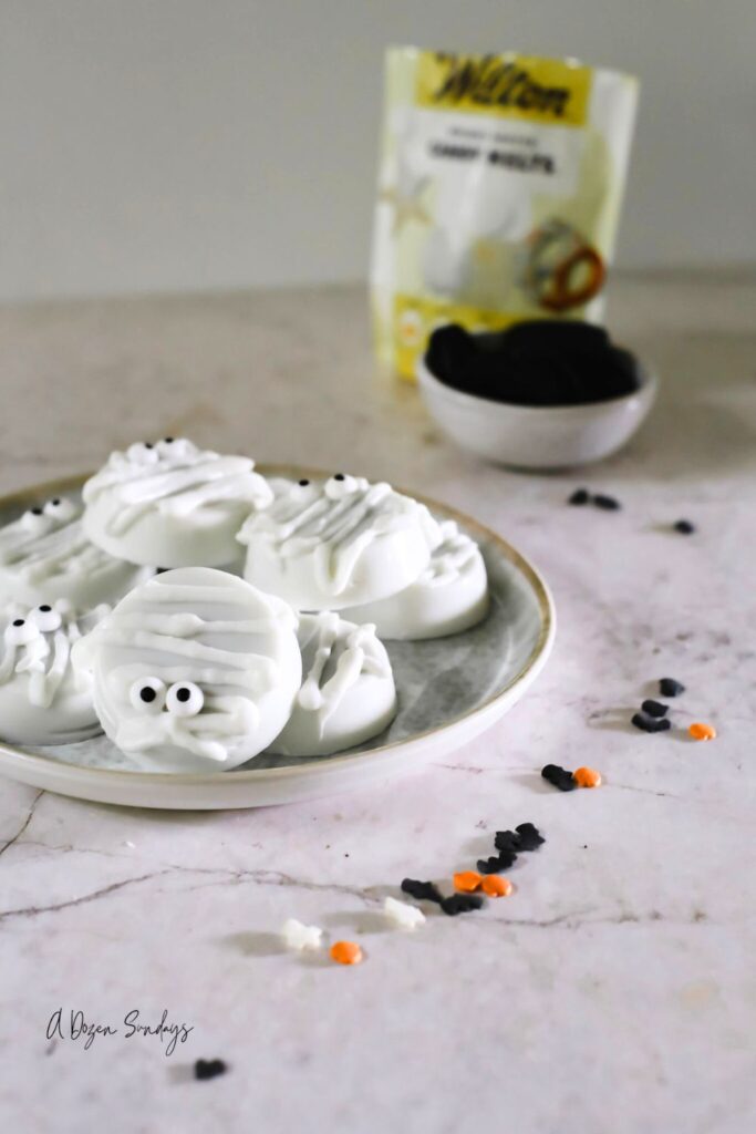 Chocolate covered Oreo Mummies from a recipe on A Dozen Sundays