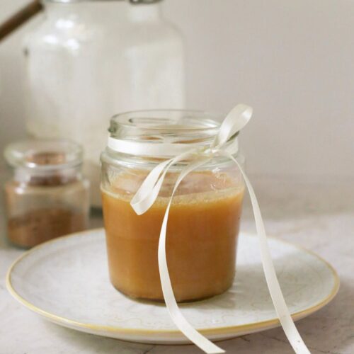 A jar of homemade caramel sauce