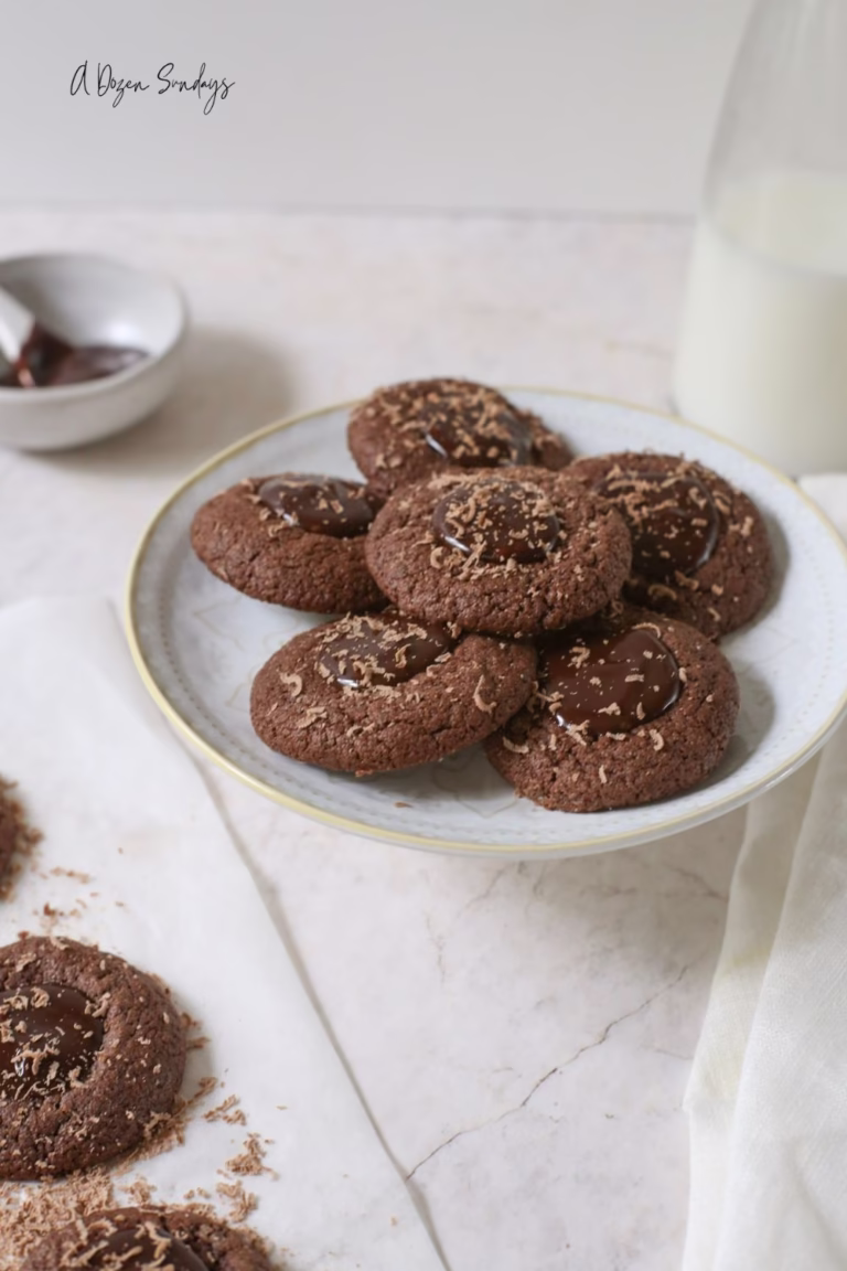 A white plate with Double Chocolate Thumbprint Cookies on